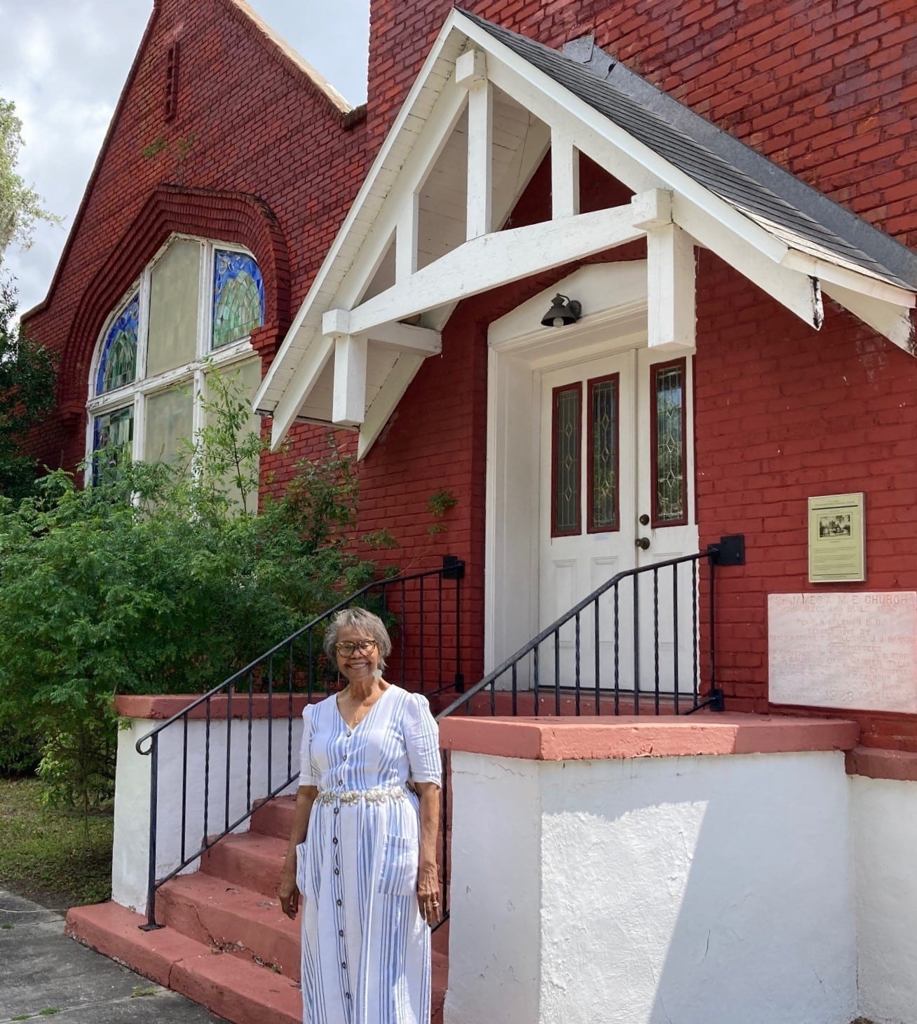Julia crop Outside a church