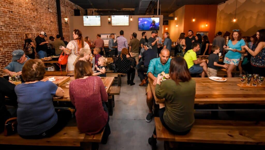 guests gather at deviant wolf brewing