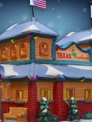 A picture of Texas Roadhouse done in the style of a Christmas Village house