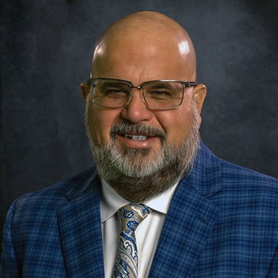 headshot of Commissioner Patrick Austin